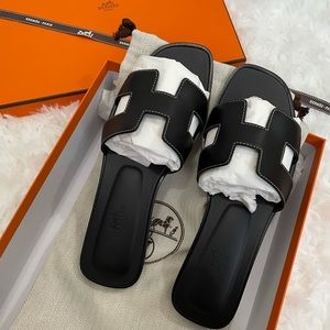 Hermès black Oran sandals